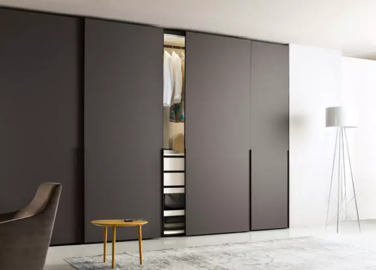 Modern living room design with storage cabinets and wardrobes