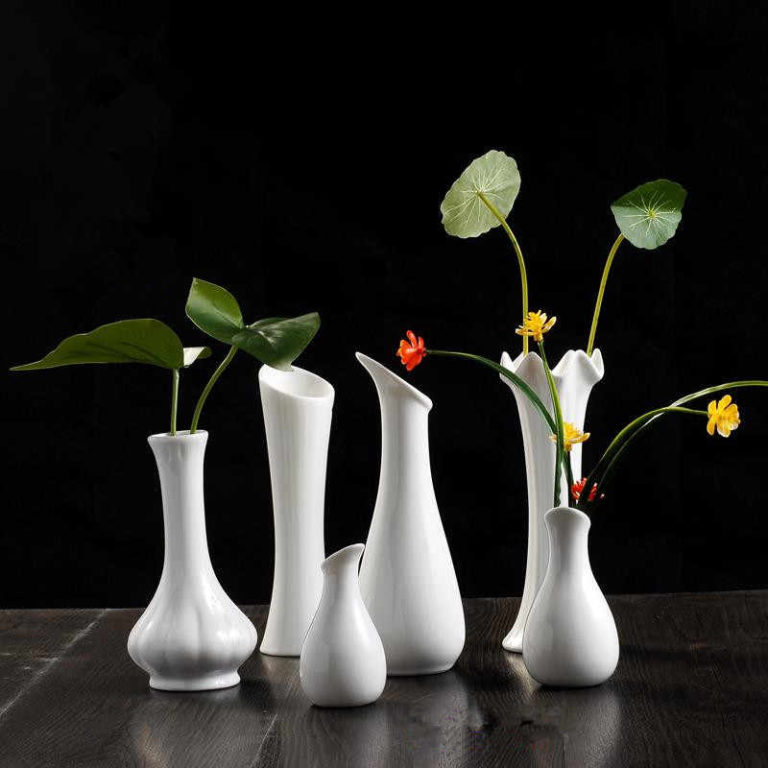 Interior decoration with white vases