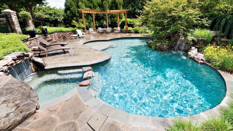 A stunning backyard solution – a pool with a waterfall will make you freeze with delight