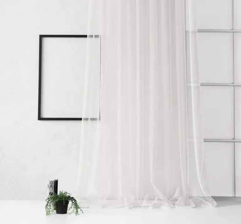 White curtains in the interior: style and design