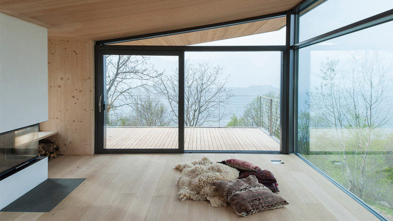 An open design living space with a glass wall living room