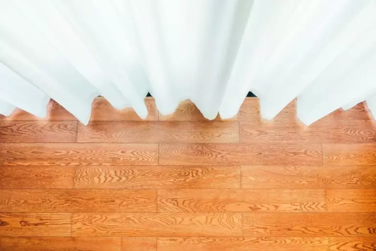 Should curtains touch the floor? What curtain drop length to choose?