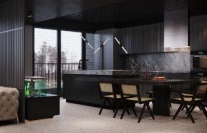 Rich textured backsplash and backdrop in an all-black kitchen