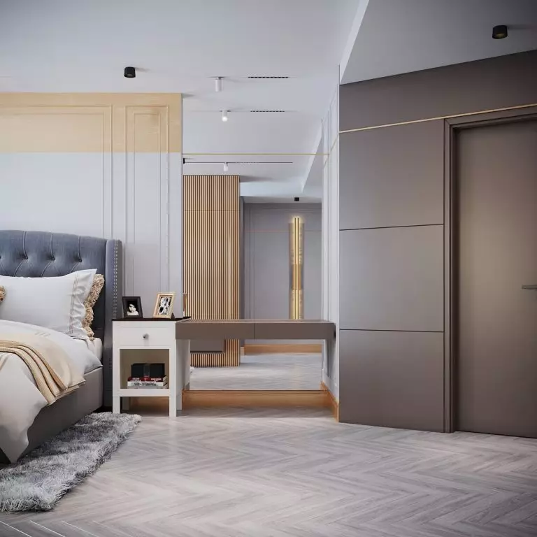 A few more inches: the full-length mirror expands the borders of an open-concept bedroom