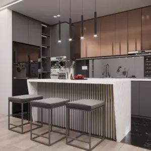 Marble-textured and gold-polished kitchen island decorates the cooking space