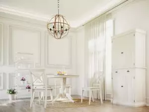 Snowy-white dining area bathed in natural light