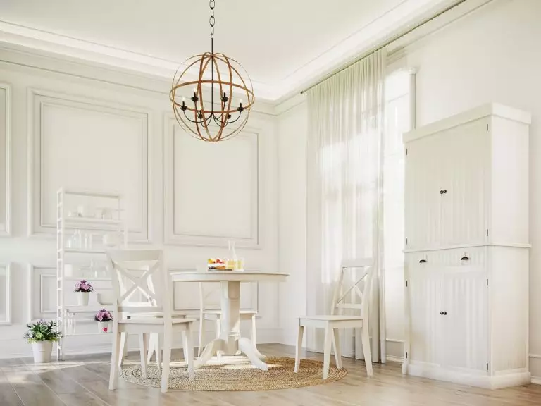 Snowy-white dining area bathed in natural light