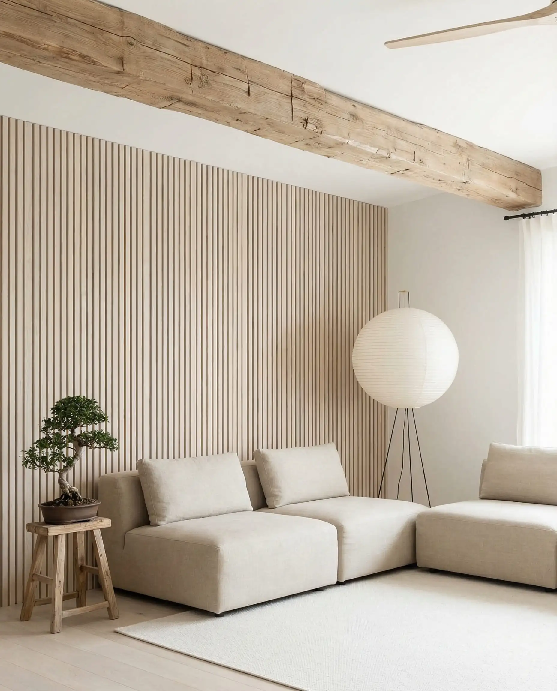 Room blending Japandi wood slats with rustic farmhouse beams and low profile furniture.