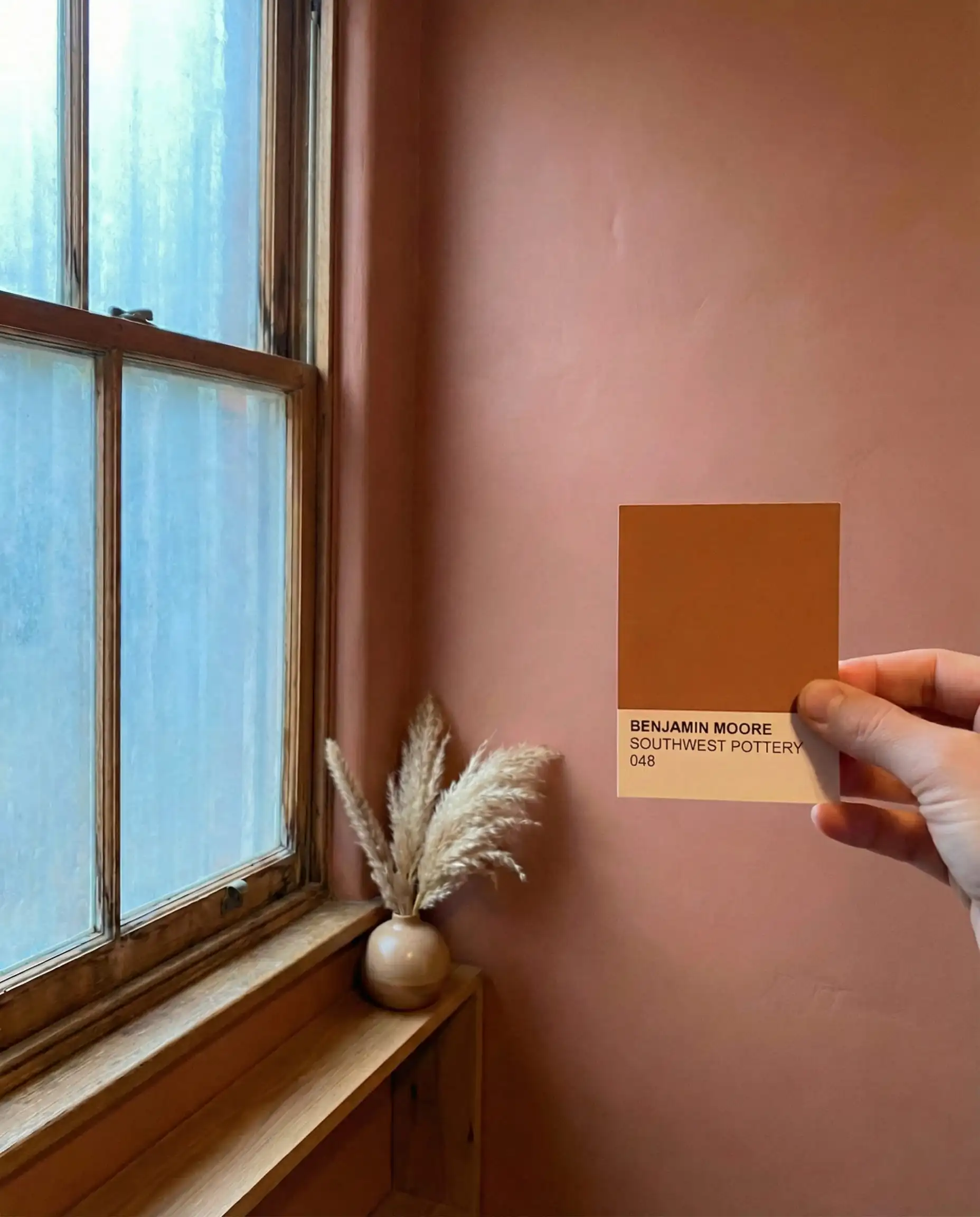 Interior shot showing how Benjamin Moore Southwest Pottery 048 warms up a cool North-facing room.