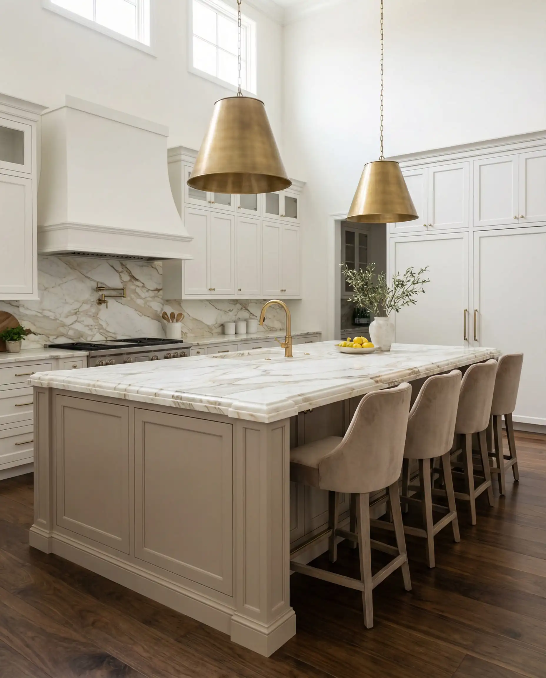 Large kitchen island painted in Sherwin-Williams Loggia SW 7506 with Calacatta Gold marble top.