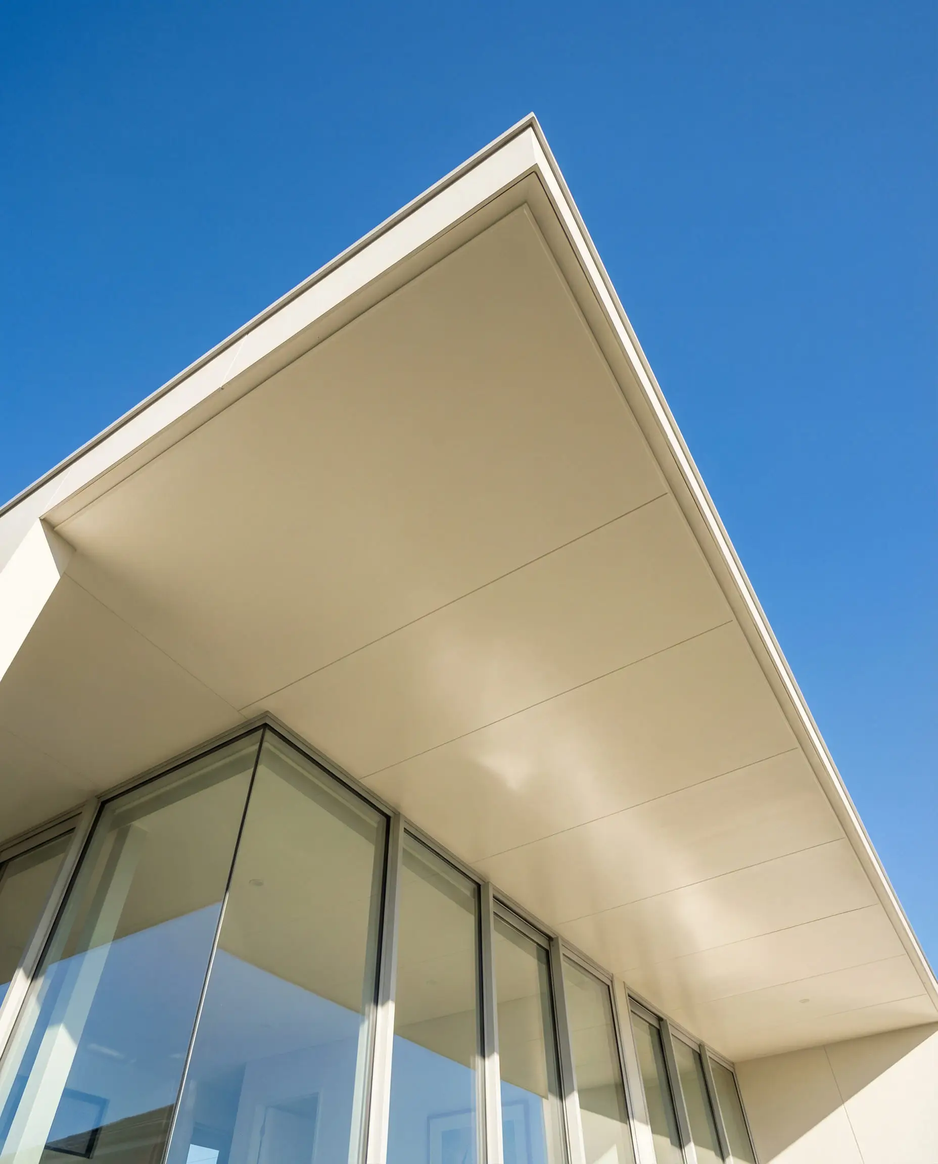Modern roof overhang and soffit painted in Sherwin-Williams Pure White.