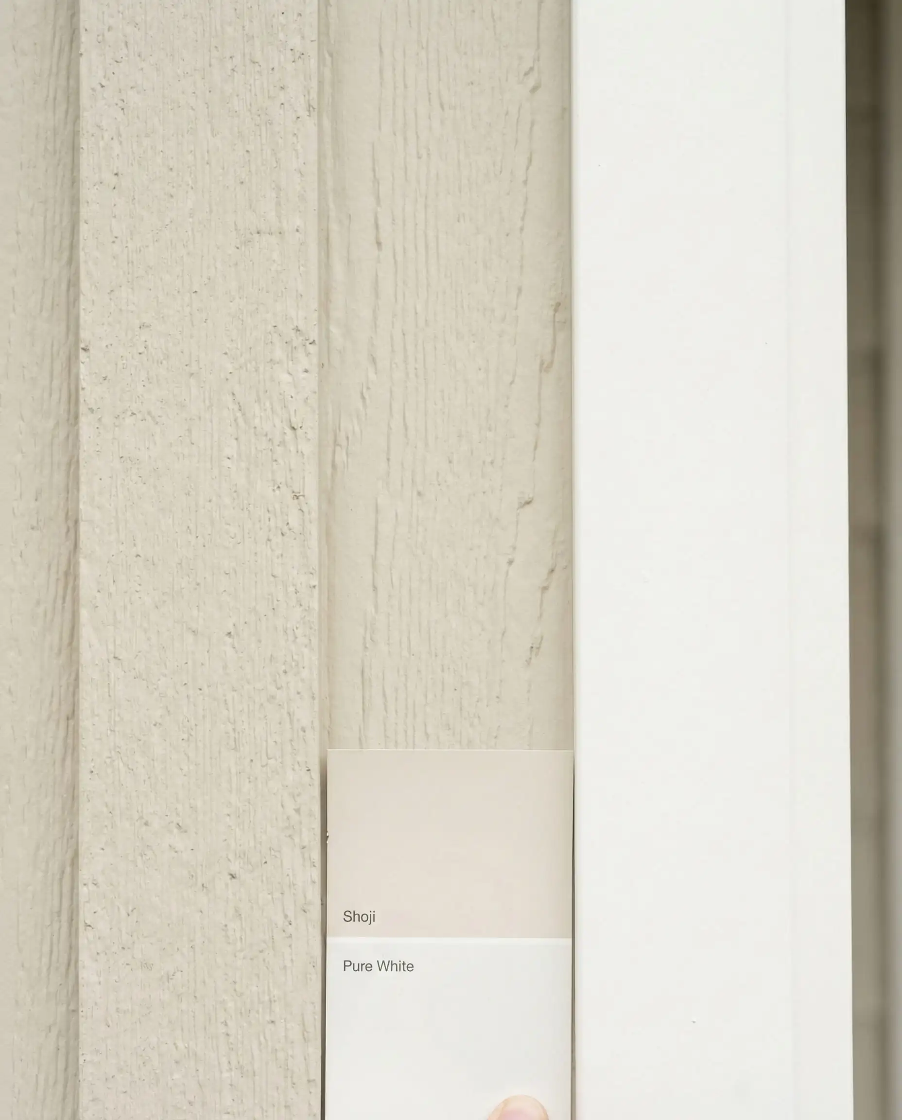 Comparison detail showing Sherwin-Williams Shoji White siding next to Pure White trim.