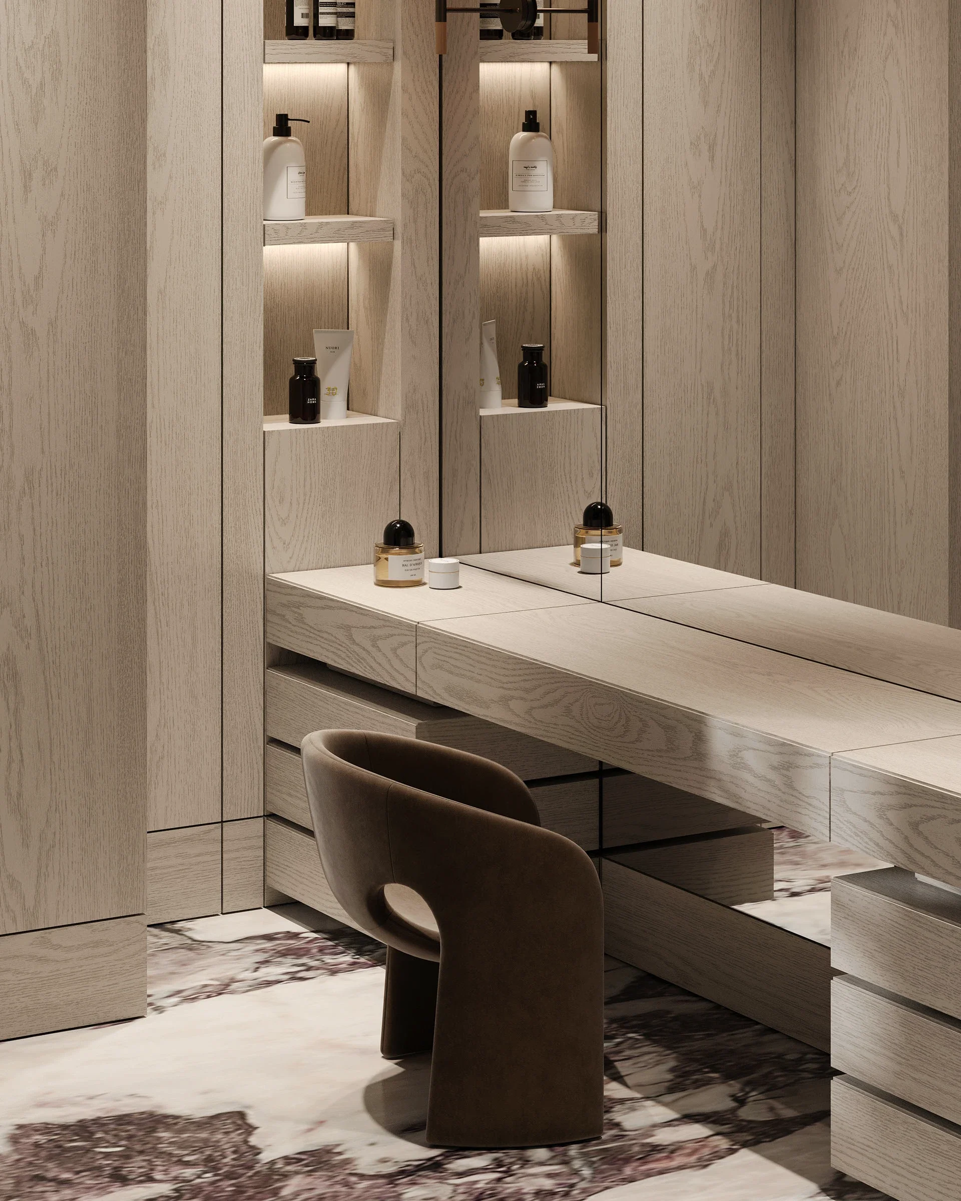 A contemporary light ash wood vanity area featuring a mirrored desktop, recessed lit shelving displaying beauty products, and a unique brown sculptural chair, set over a purple and white marble floor.