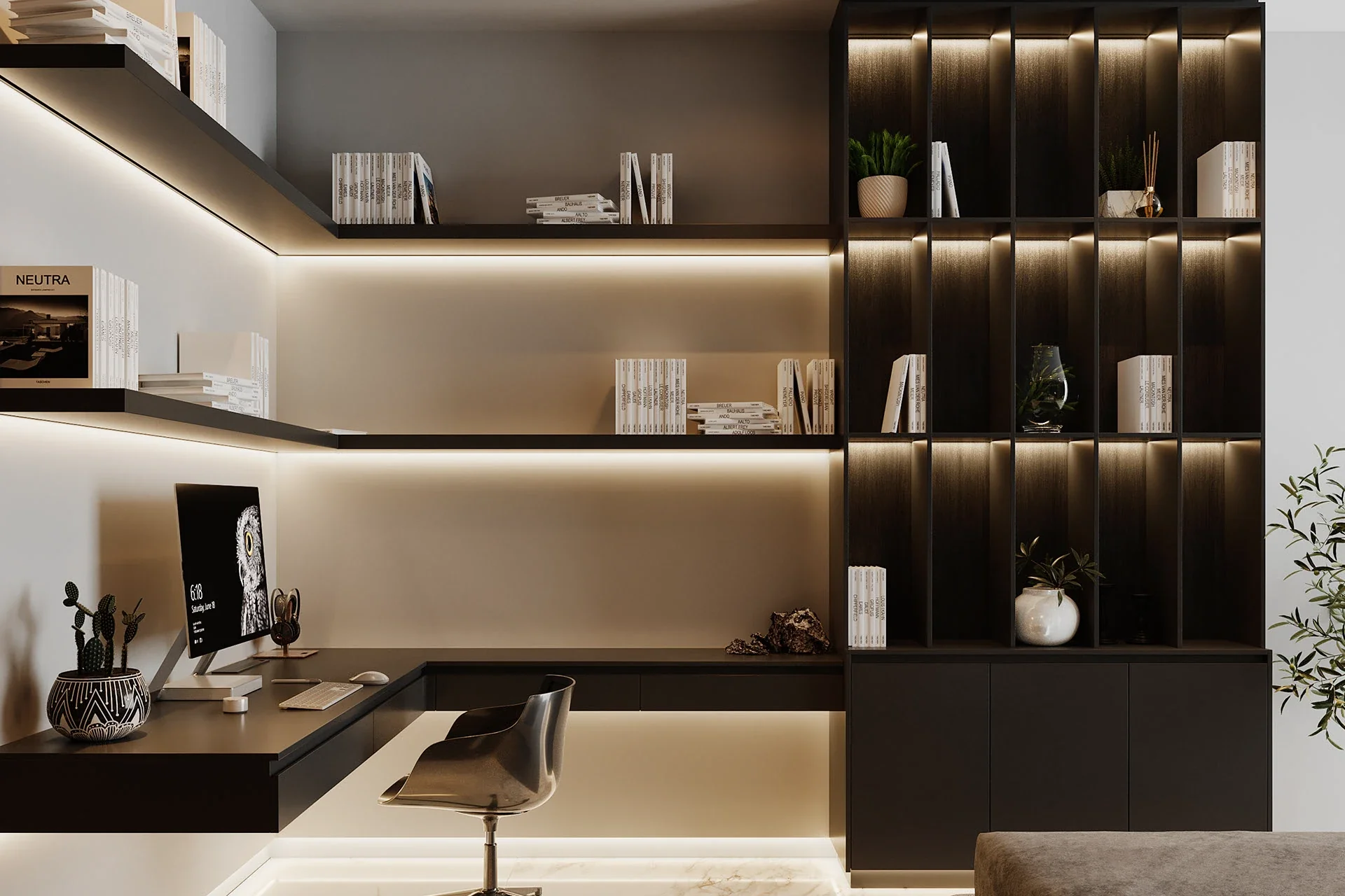 A sleek modern home office setup featuring a built-in black L-shaped floating desk and a tall, multi-compartment black bookcase, all beautifully illuminated with warm integrated LED strip lighting.