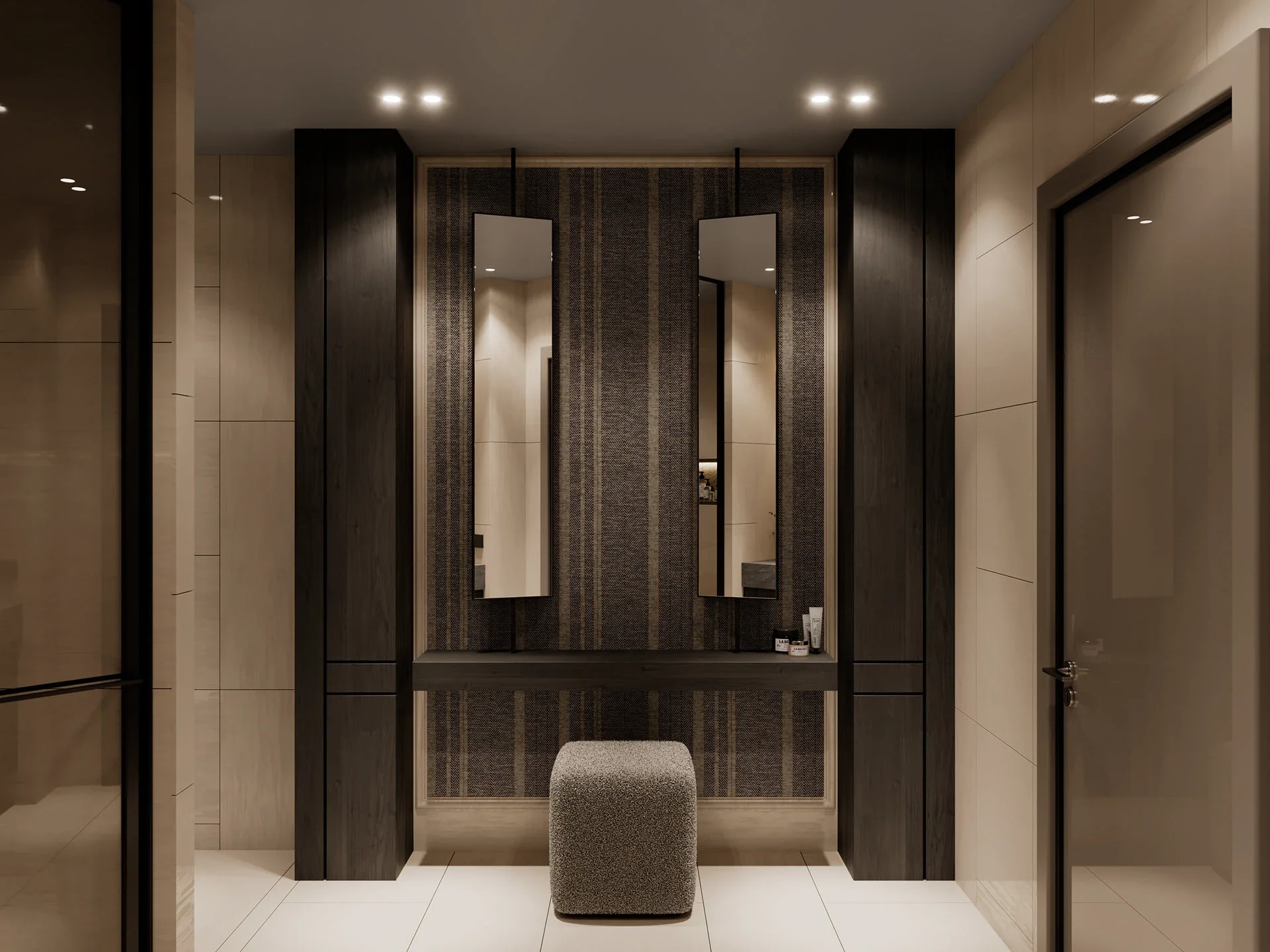 A contemporary vanity nook featuring a floating dark wood desk, two tall vertical mirrors, textured grey striped wallpaper, and a cozy grey textured stool.
