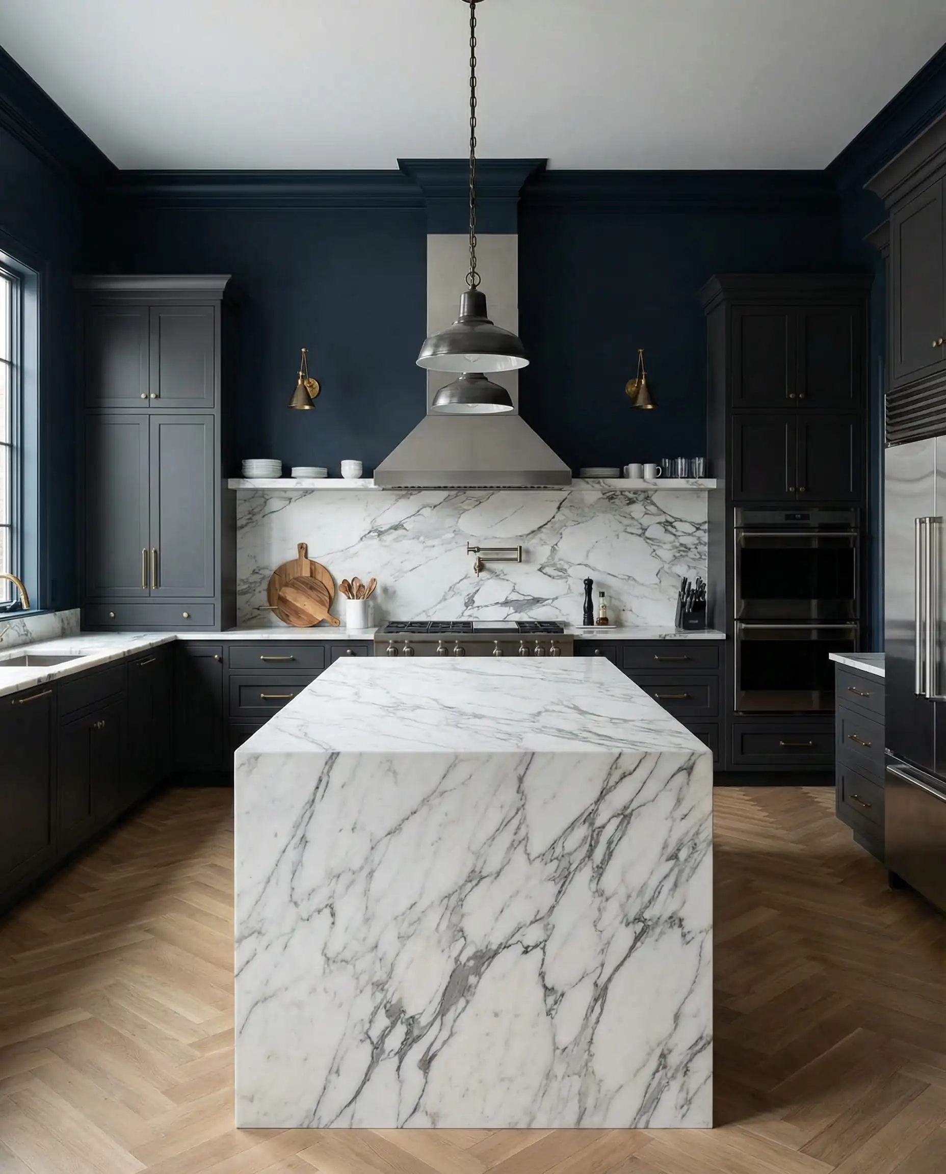 Symmetrical kitchen shot featuring Iron Ore dark gray cabinets against midnight blue walls with white marble contrast.