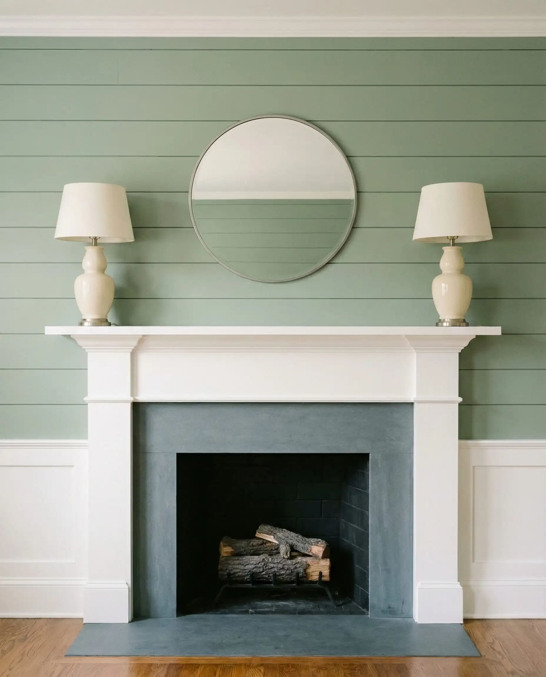 Symmetrical fireplace showing a mantel extending 8 inches past the firebox trim on both sides for visual balance.