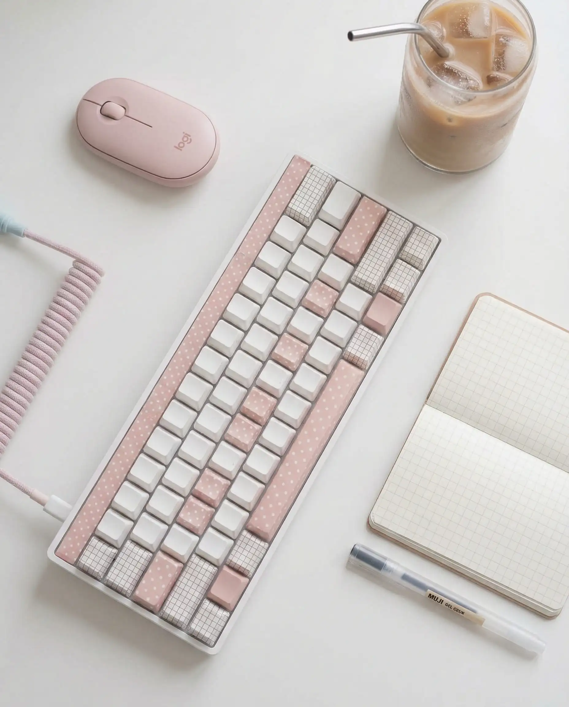 Mechanical keyboard customized with pastel patterned washi tape on the keycaps.