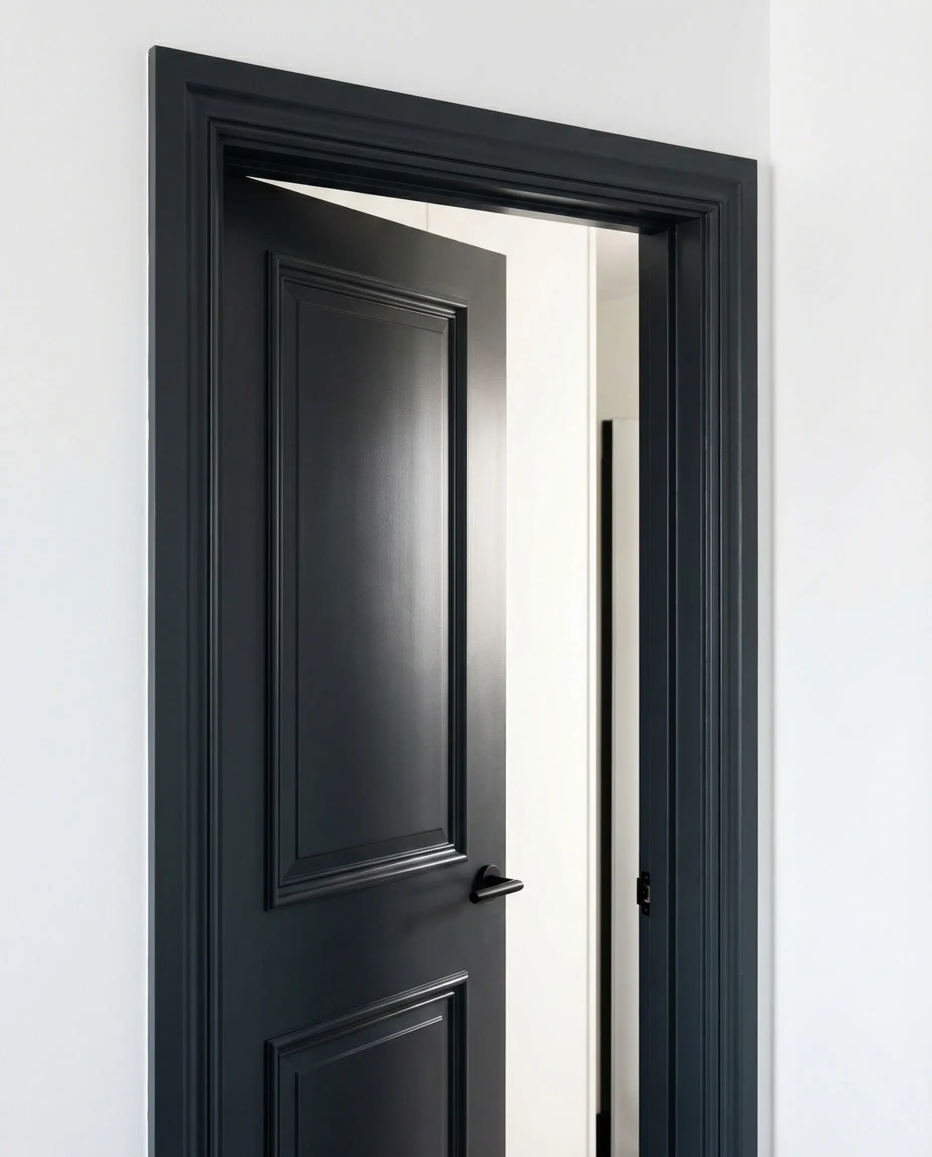 Interior door and surrounding frame painted in matching charcoal grey (Iron Ore) for a seamless custom look.