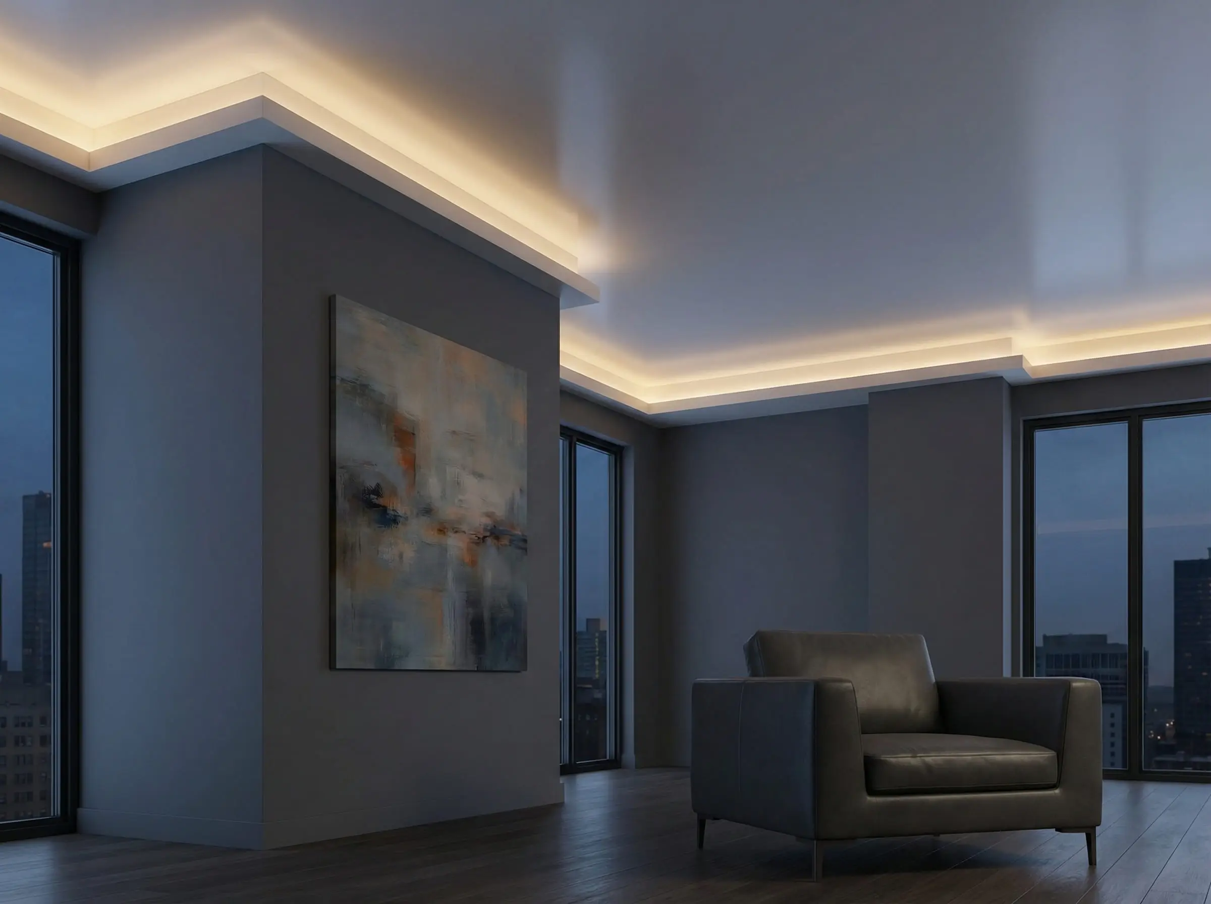Modern media room featuring a floating crown molding installation with hidden warm LED strip lighting casting a glow on the ceiling.