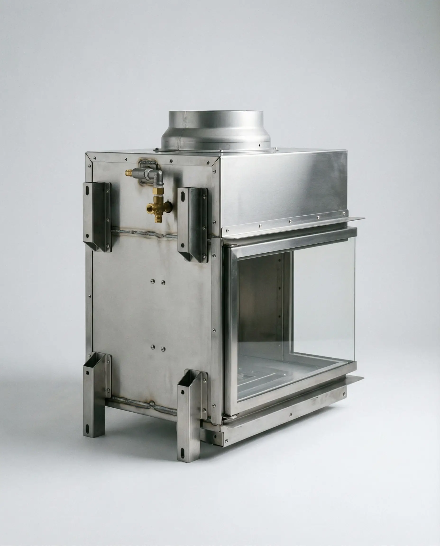 A studio product shot of a metal gas fireplace insert showing the venting collar and construction details.