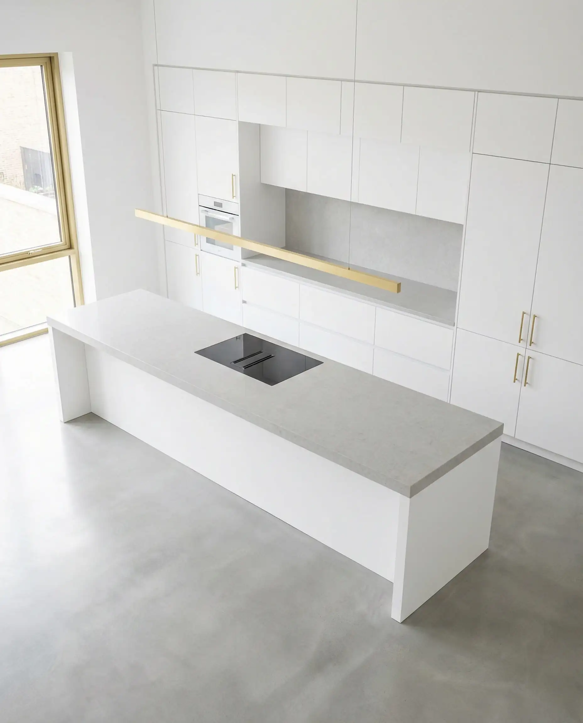 High-angle view of a pristine minimalist white kitchen with gold lighting and clean lines.