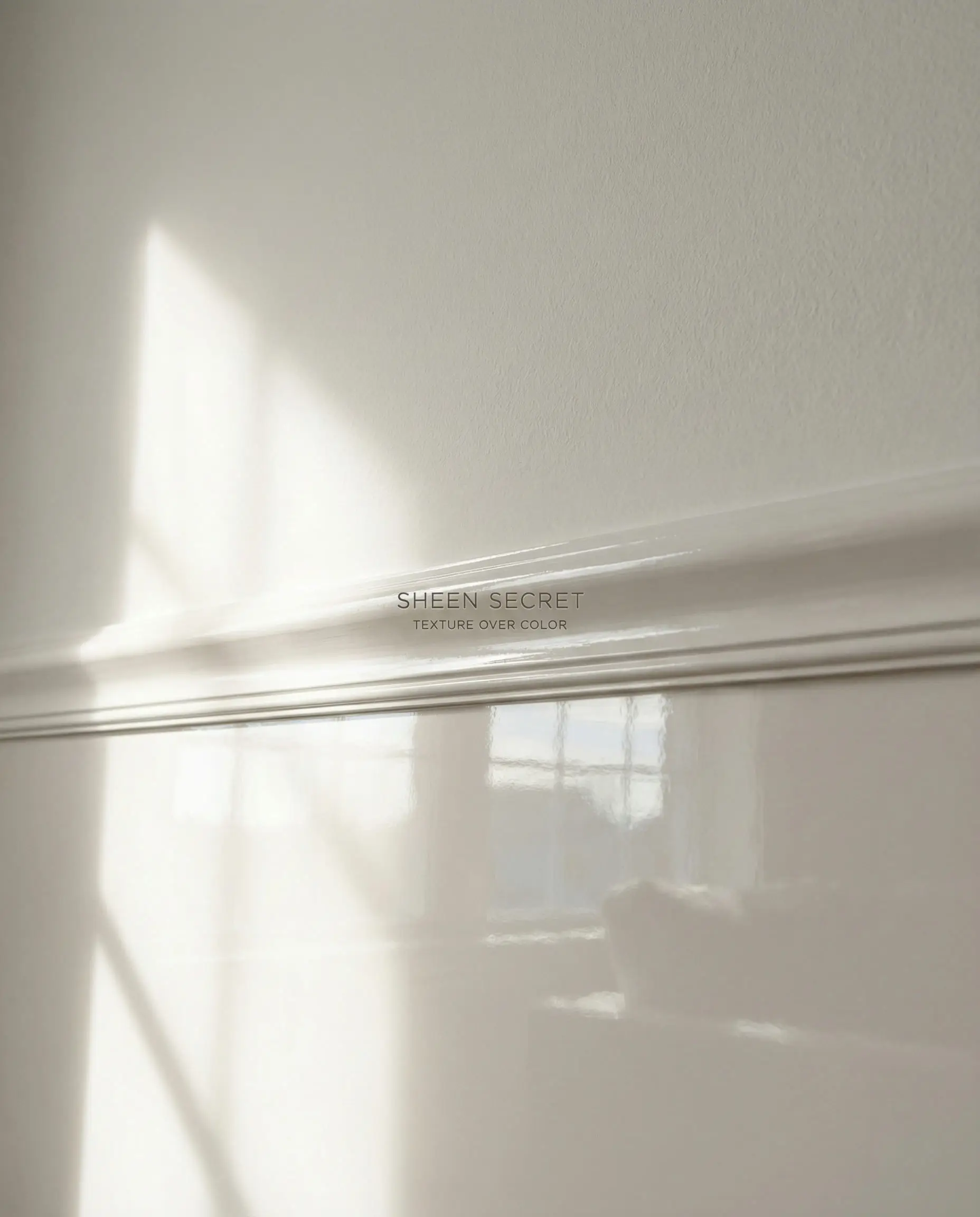 Split-focus close-up showing the difference between flat wall paint and high-gloss trim paint in the same color.