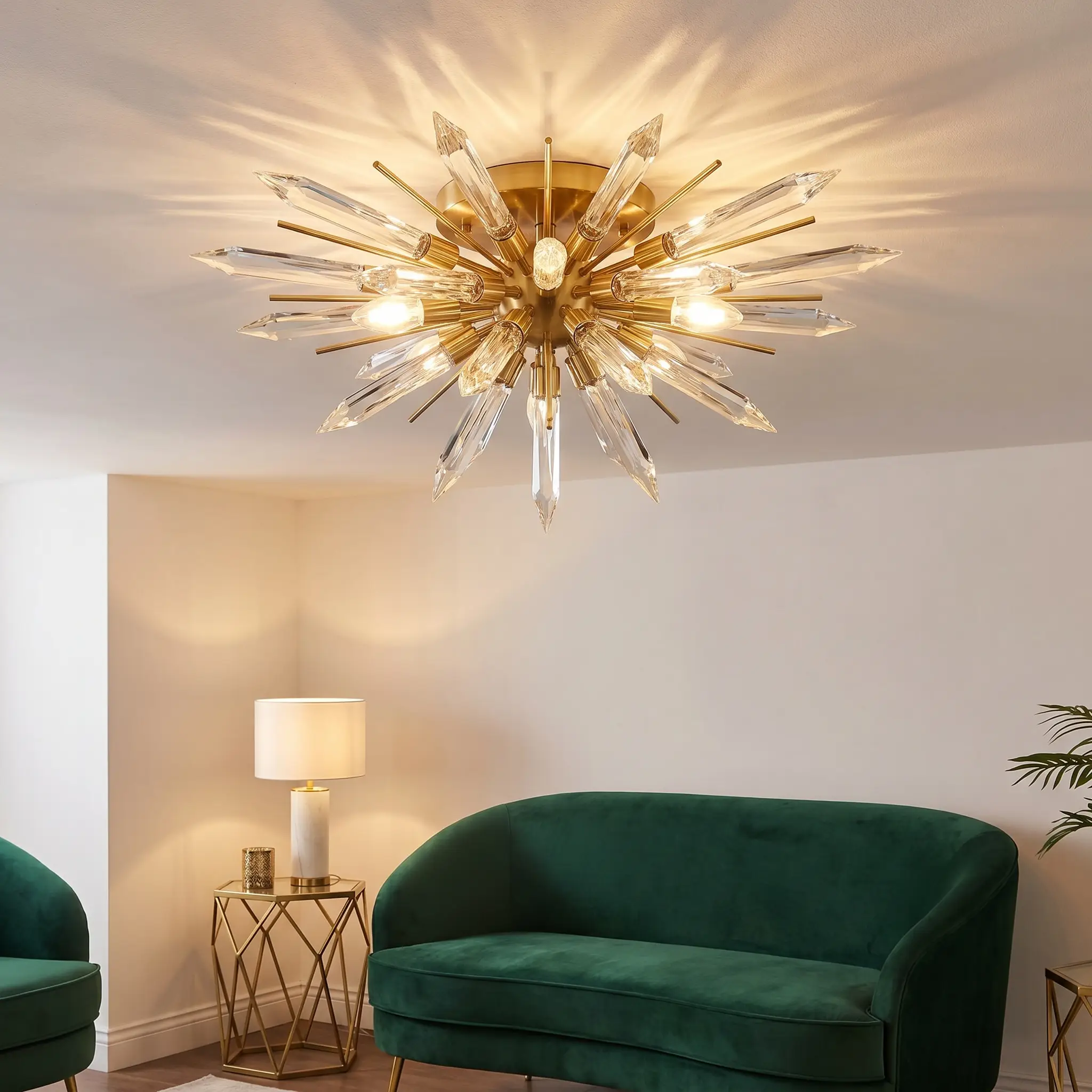A low-profile starburst ceiling fixture made of hand-cut beveled crystal and polished brass shines over a sitting area with a curved velvet settee.