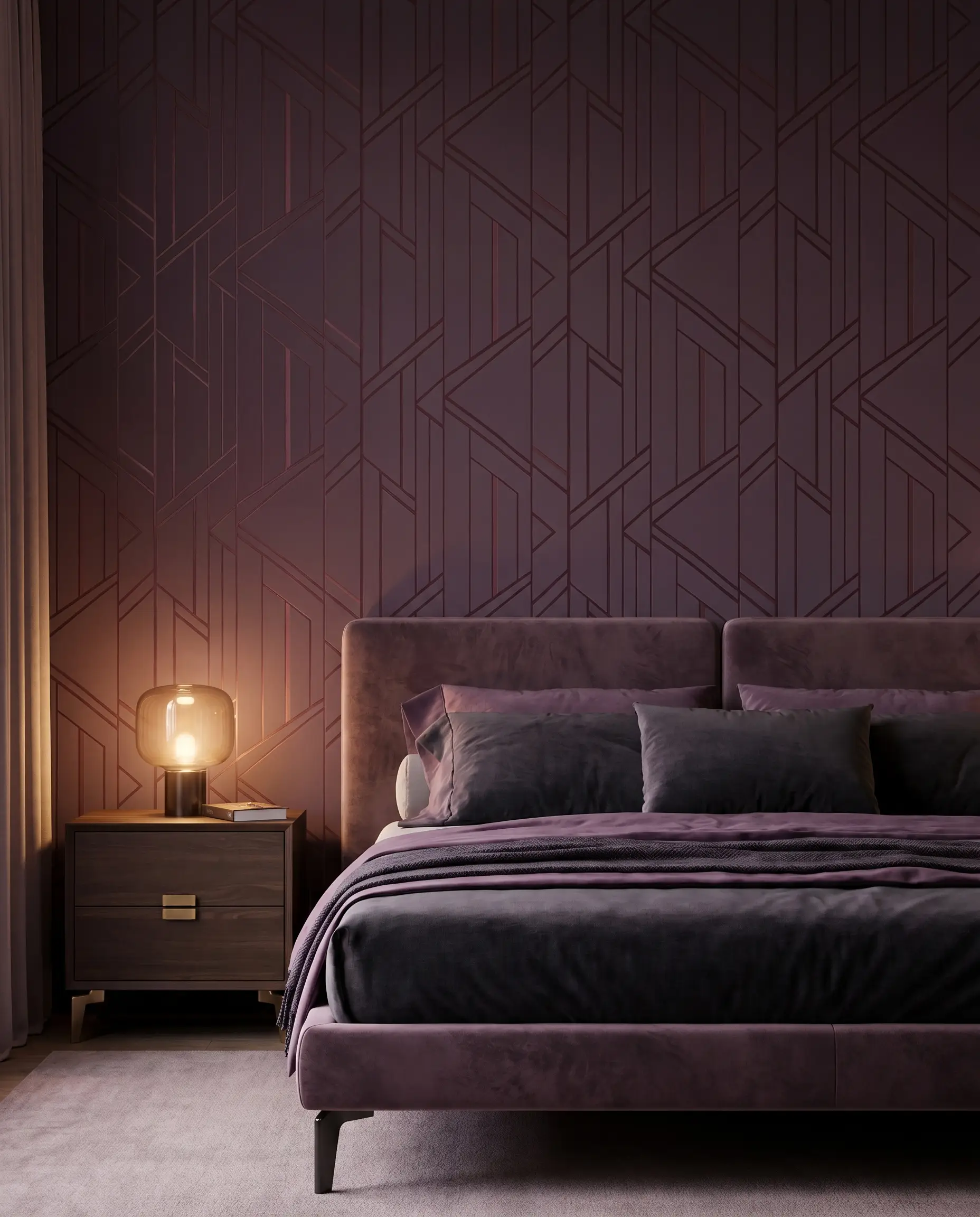 Deep plum tone-on-tone geometric wallpaper with matte metallic ink provides a rich backdrop for a sleek nightstand and a bed dressed in premium linens.