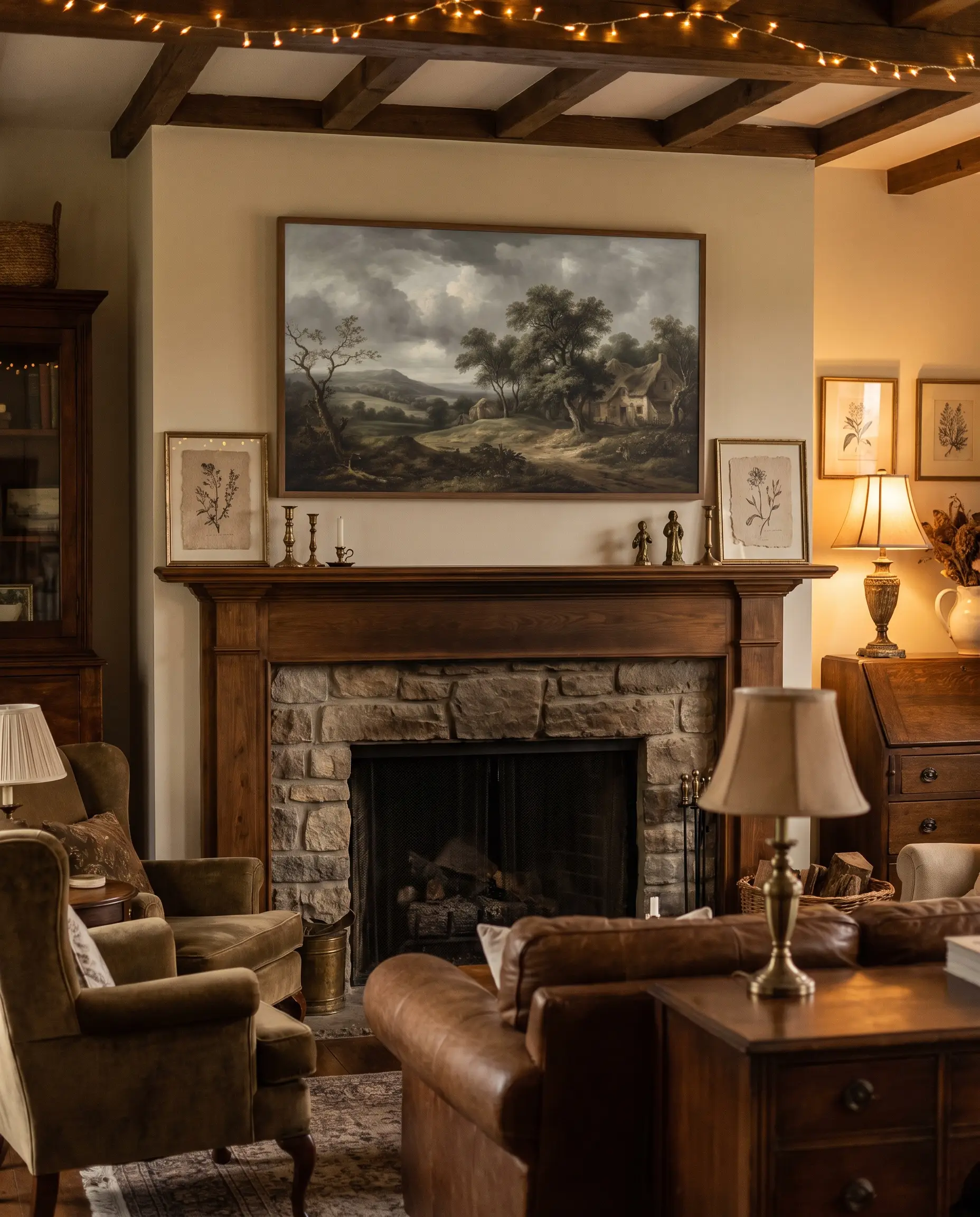 A digital frame TV displays a vintage pastoral oil painting above a wooden living room mantel styled with matte textured paper prints and brass accents.