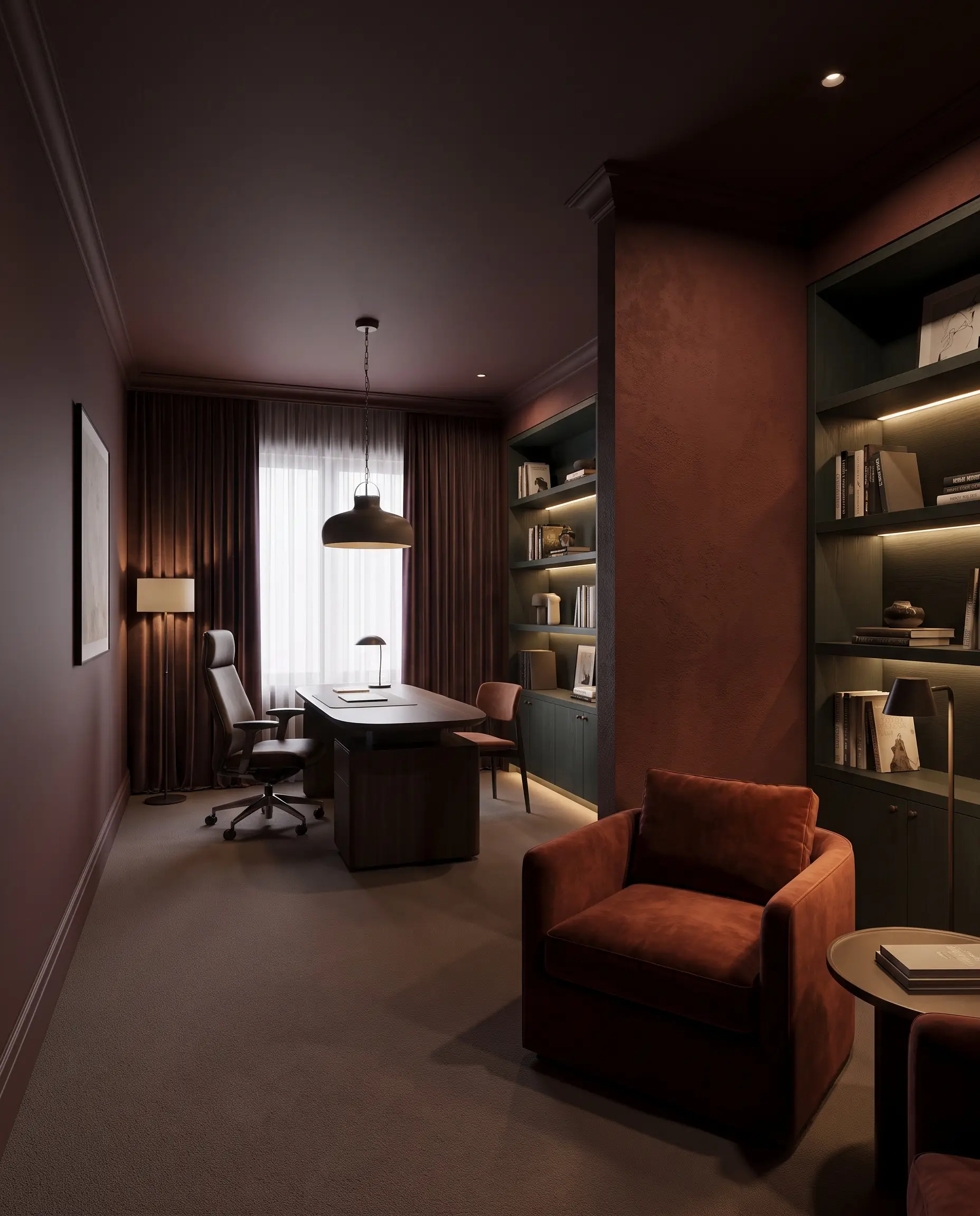 Benjamin Moore Appalachian Brown walls envelop a plush velvet armchair and sleek commercial desk, accented by Rookwood Dark Red and Studio Green shelving.